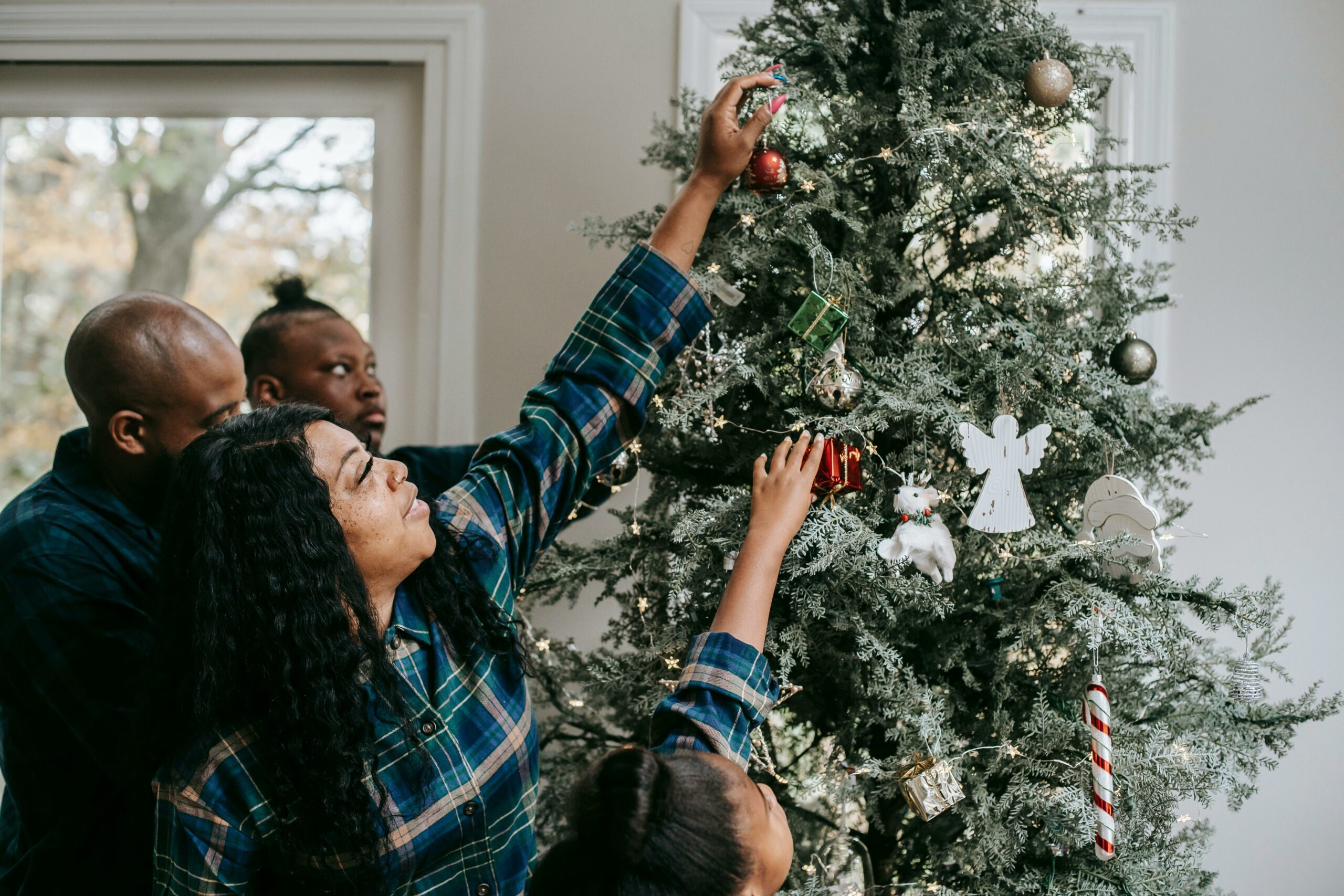 family decorating tree